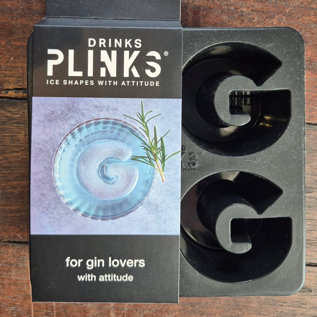 Plinks gin packaging on a wooden surface